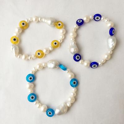 China Vintage Fashion Evil Eye Pearl Bracelet 100% AA+ Freshwater Pearl Good, 10-13 mm Baroque Shape, Available in Yellow, Blue, Green Eyes for sale