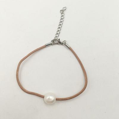 China 100% BOHEMIA nature freshwater pearl bracelet with real leather cord .10-11 mm nature pearl baroque shape for sale