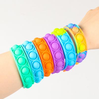 China Chridren Toys Glow in Dark Wristband Shaker Toys, Sensory Bracelet Toy Fidget Silicone Push-Up Noise Wearable Bubble Wristband for Kids for sale