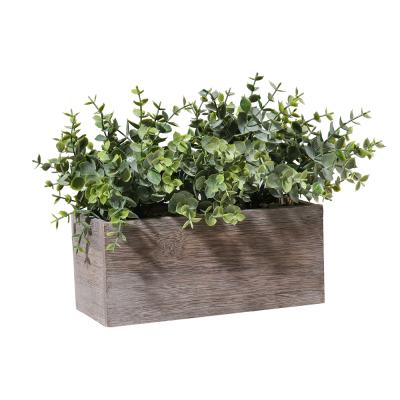 China Modern Artificial Eucalyptus Wood Potted Plant For Home Decor for sale