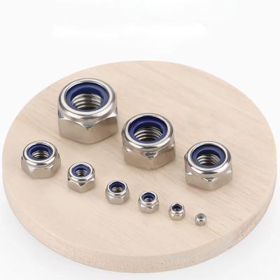 China Titanium Pan Hex Flange Nut Metal Insert Lock Nut M14 M4 M30 M5 M28 M15 M12x1.5 gr5 Flange Nuts for sale