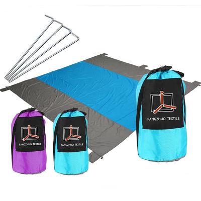 China Compressed Nylon Pocket Compact Sand Proof Beach Blanket for sale