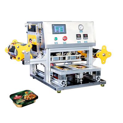 China Automatic Mini Frozen Food Tray Sealing Machine With 2-Cavity In One Mold Table Top Tray Sealer Machine For Food for sale