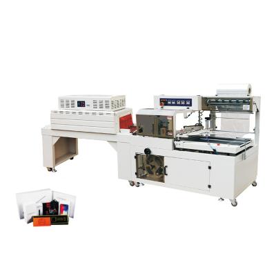 China Other Full Automatic Bottle Plastic Book Cup Film Wrapping Machine POF Thermal Shrink Paper Wrapping Machine for sale