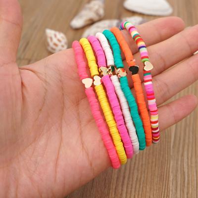 China New Trend BOHEMIA Gold Plated Elastic Heart Bracelet Rope Rainbow Polymer Clay Beads Bracelets Set with Natural Hematite Beads for Women for sale