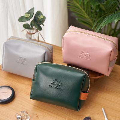 China Durable OEM Vegan Travel Toiletry Bag Custom Women PU Leather Cosmetic Organizer Bag for sale