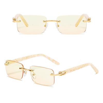 China Fashion Sunglasses Couturier Square Rimless Sun Lenses Shading Mental Sunglasses Men Women Sun Lenses for sale