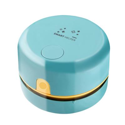 China Multi-Color Small Table Mini Desk Vacuum Cleaner Desktop Debris Portable Dry Dust Sweeper for sale