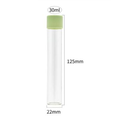 China Hot Selling Clear Glass Vial Child Resistant Pill Pre Roll Packaging Tube With Child Safe Cap for sale