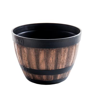 China 100% handmade plastic wooden flower pots with drainage hole for sale