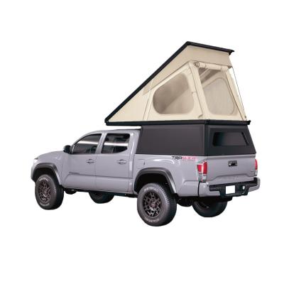 China Fabric Canvas Outdoor Camping Wild Tent 2022 Hard Cover Pickup Truck Larger Roof Top Tent for sale