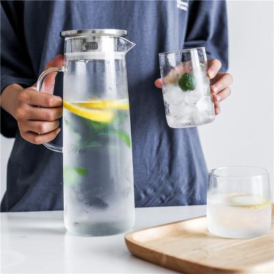 China Large Capacity Viable Summer Juice Drinking Tea Pitcher Water Clear Glass Jar With Handle for sale