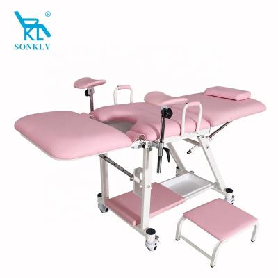 China Soft and comfortable sonkly brand luxury examination bed gynecological consultation bed high female care for sale