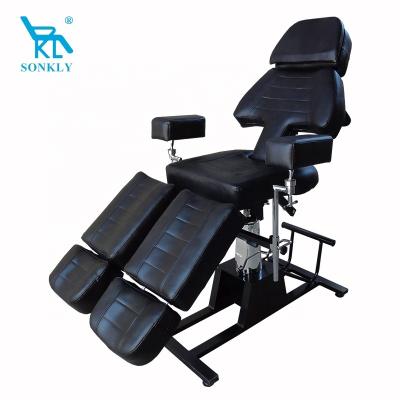 China Beautiful appearance sonkly brand hydraulic height adjustment tattoo client chair beauty salon chair with stable Chrome base for sale