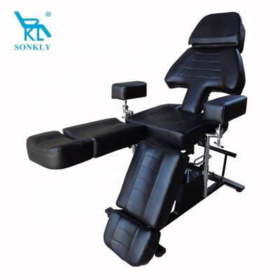 China Hot beautiful appearance salon furniture sonkly brand in usa fully adjustable armrest tattoo supplies hydraulic tattoo chair bed for sale