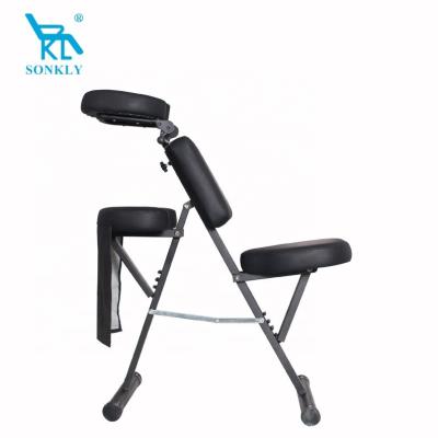 China Beautiful appearance sonkly brand portable lightweight massage chair with cushion travel acupuncture massage tattoo spa leather chair for sale