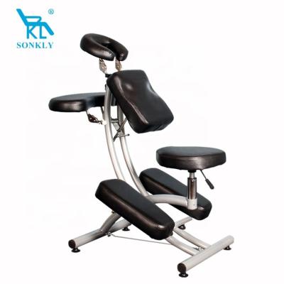 China Beautiful appearance sonkly brand portable lightweight massage chair with cushion travel acupuncture massage tattoo spa leather chair for sale