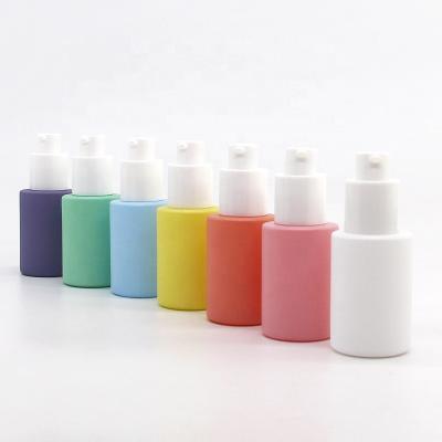 China Personal Care In Stock 1oz 30ml Pump Serum Bottle Pastel Colors Pink Blue Purple For Cosmetic Packaging for sale