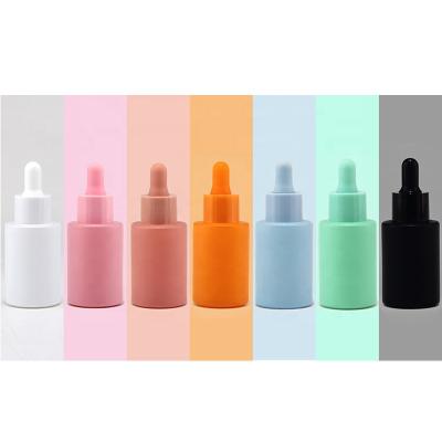 China 2022 New Design 30ml Cosmetic Flat Shoulder Custom Color Glass Bottle With Custom Dropper For Essential Oil Hair Oil for sale