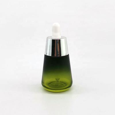 China Essence of Gold 30ml Printing Perfect Moisturizing Repair Gold Essential Oil Dropper Cosmetic Glass Bottles for sale