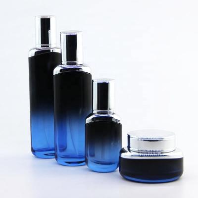 China Hot Selling Personal Care Fashion Custom Glass Cosmetic Cream Bottles And Jars Set 100ml Glass Cosmetic Bottles With Pump for sale