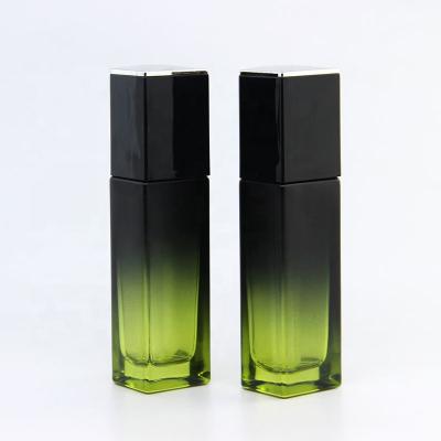 China Personal Care Fashion Oil Cosmetic Glass Bottle 30ml Lotion Pump Base Liquid Serum Bottle for sale