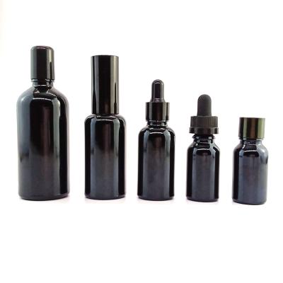 China Matte Black Cosmetic Glass Containers And Wholesale Cosmetic Bottle Luxury Serum Dropper Oil Bottles Pump Spray Packaging Customized for sale