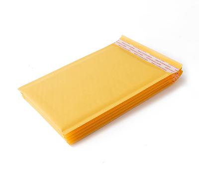 China Wholesale Low Price Eco - Friendly Paper Postage Bag Yellow Kraft Paper Bubble Bags for sale