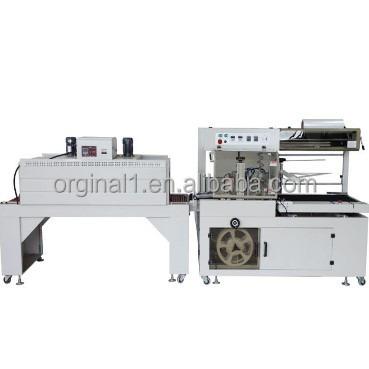 China Factory Maxi Roll Tissue Packaging Machine / Hand Towel Paper Roll Automatic Labeling Sealing And Shrinking Heat Tunnel Machine for sale