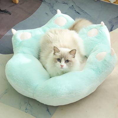 China New Small Cat Paw Plush Kennel Winter Breathable Creative Warmth Universal Round Cat Kennel Cat Bed Dog Kennel New for sale