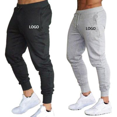 China Anti-Wrinkle Customized Premium Mens With Elastic Ankles Cotton Plus Size Mens Jogger Pants Solid Tapered Pants Gym Track Panties for sale