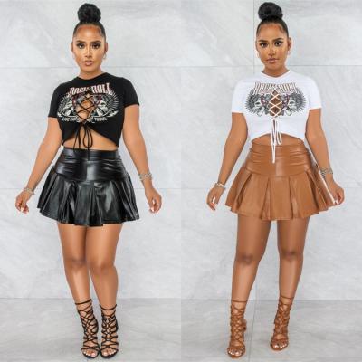 China 2022 New Fashion Formal Women's Two Piece T-Shirt With Hollow Lace And Bare Navel Pu Leather Short Sleeve Pleated Mini Skirt Set for sale