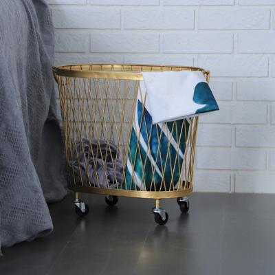 China Sustainable Multifunctional Luxury Style Gold Metal Sundries Storage Basket Rolling Basket for sale