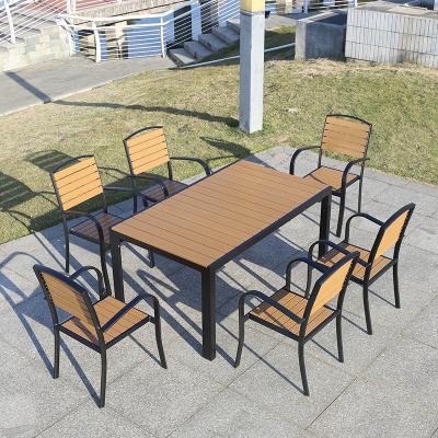 China Waterproof Outdoor plastic wood table and chairs balcony modern table set combination waterproof outdoor plastic wood table and chair set for sale