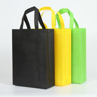 China Eco-Friendly Fast Delivery Promotional Colorful Non Woven Large Foldable Stock Tote Shopping Bag for sale