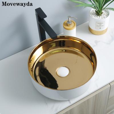 China Easy Clean Luxurious Bathroom Artistic Ceramic Body Countertop Gold Color Wash Basin Round Shape Sinks Plate Process Wash Basin for sale