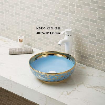 China Modern Hot Sale Bathroom Sink Round Patterned Glazed Ceramic Countertop Wash Basin for sale