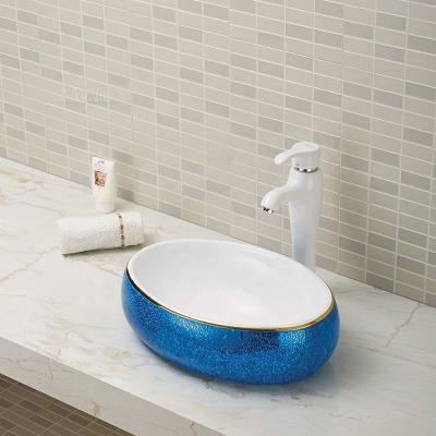 China Modern Luxury Style Small Size Glazed Ceramic Golden Color Wash Basin Art Countertop Basin for sale