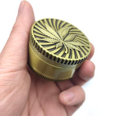 China Classic Newcomers Design Classic Bronze Grinder Dry Weed Carved Herb Crusher Tobacco Grinders for sale