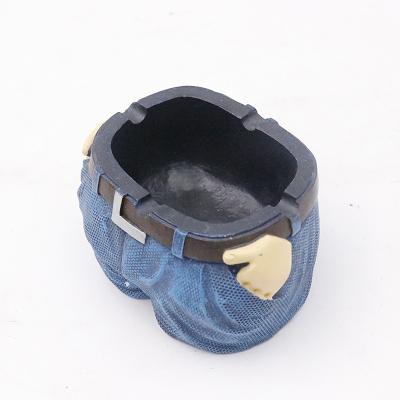 China Smoking Acessories Shape Circle Shape Funny Cowboy Novelty Ashtrays Pants/Jacket Design Resin Portable Ashtray for sale