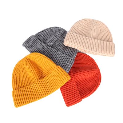 China COMMON Fashionable Custom Hats Beanie Knit Hat Logo Solid COMMON Color Winter Warm Embroidery for sale