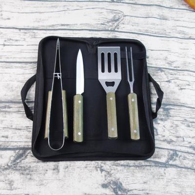 China New Design Easily Cleaned Wooden Handle Outdoor 4 Piece BBQ Tool Kit With Cloth Bag for sale