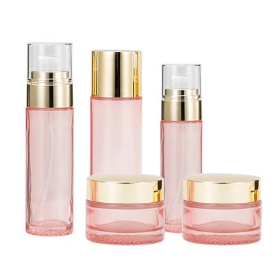 China Personal Care Transparent Rose Lotion Pump Bottle Glass Face Cream Cosmetic Bottle for sale