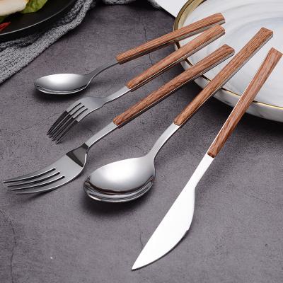 China 18-0 Stainless Steel Wood Handle Style Spoon Fork Knife Stocked Portuguese Gold Plated Cutlery Set for sale