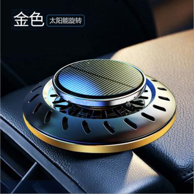 China Solar Aromatherapy Rotating Car Scent Air Freshener Car Diffuser Solar Eco-friendly Light Energy Car Scent Solar for sale