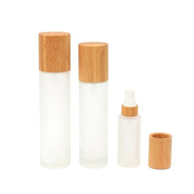 China Lotion Screw Cap Wooden Latex Glass Cosmetic High Quality Grain Frosted Lotion Bottle for sale