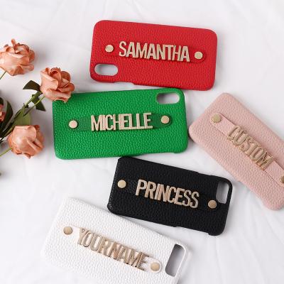 China Shockproof Standing Strap Letter Custom Personalize Name Pebble Leather Phone Case For iPhone13 Pro Max Luxury Cover for sale