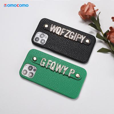 China Custom Leather Pebble Name Cowhide Phone Case Shockproof For iPhone 14 pro Max Diamond Metal Letters Cover Coque for sale