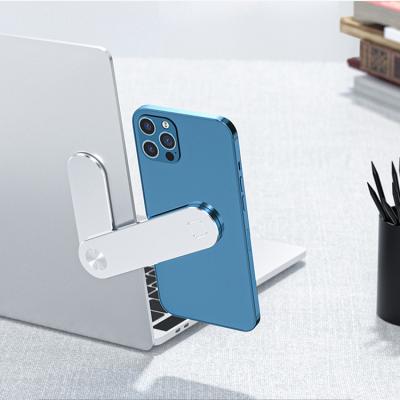 China Universal Magnetic Adjustable Expansion Bracket Mobile Phone Clip Mount Side Laptop Stand Magnetic Suction Mobile Phone Holder for sale