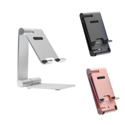 China Wholesale Adjustable Portable Folding Lifting Cell Phone Mount Holder Lazy Desktop Silicone And Eva Non-Slip Flexible Mobile Phone Holders for sale